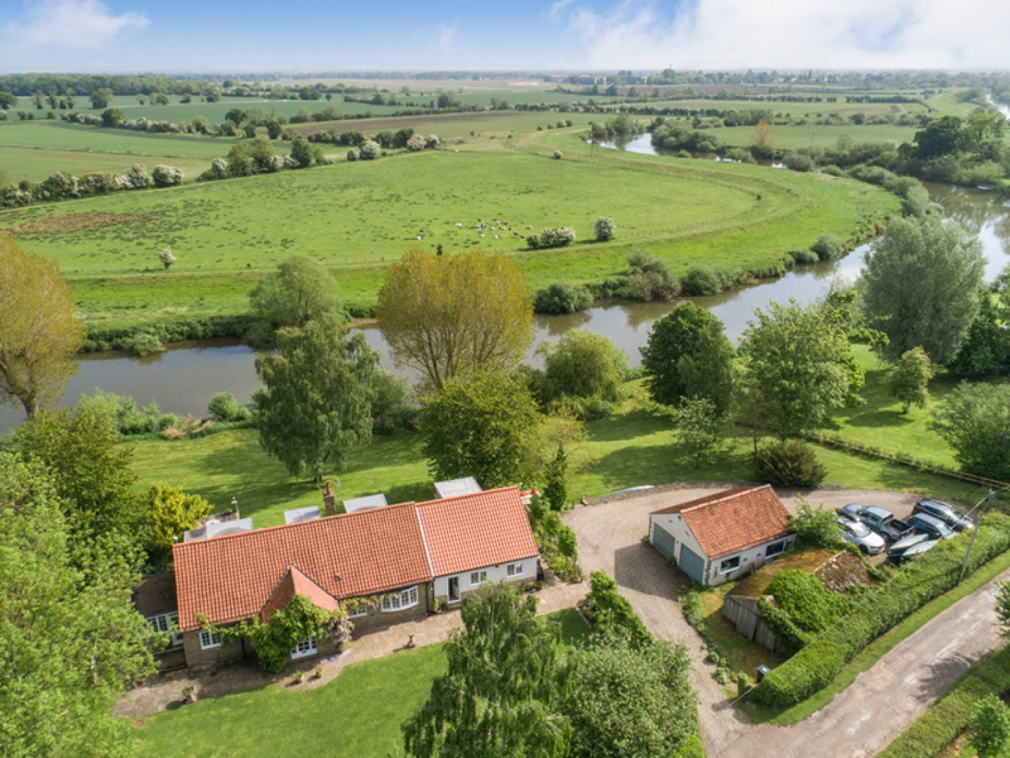 See inside this light and spacious riverside property with its own